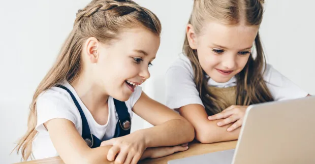 Two girls playing scratch game